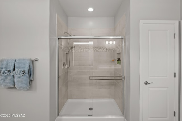 bathroom featuring a stall shower