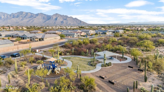 aerial view featuring a mountain view and a residential view