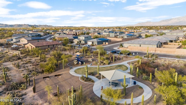 aerial view with a mountain view and a residential view