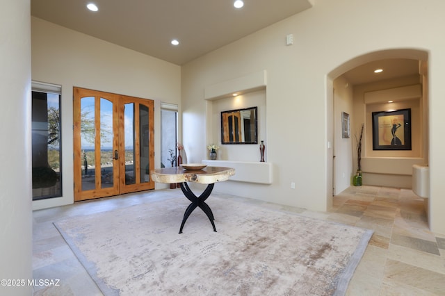7541 E Crested Saguaro Pl, Tucson, AZ 85750 - foyer featuring recessed lighting and arched walkways