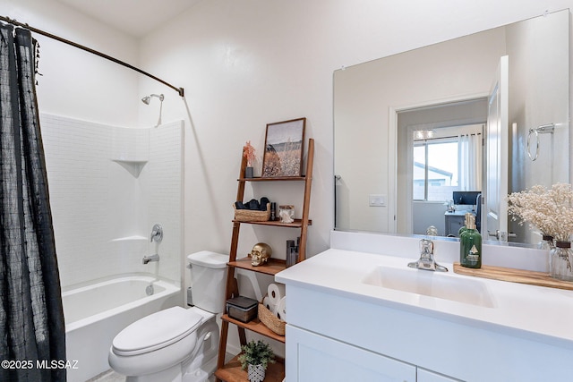 bathroom featuring toilet, shower / bath combo, and vanity