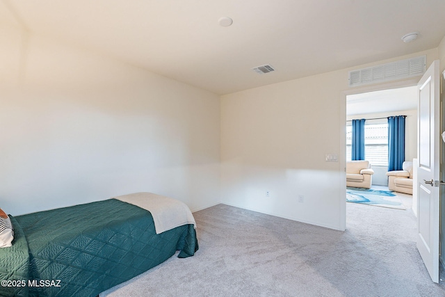 bedroom featuring carpet and visible vents