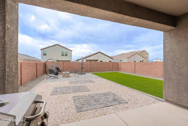 view of patio with a fenced backyard