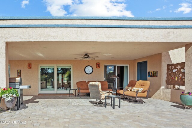 view of patio with ceiling fan