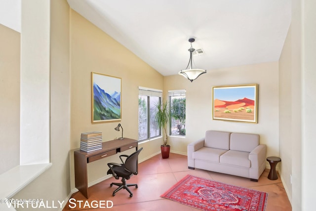 office space featuring lofted ceiling, visible vents, baseboards, and tile patterned floors