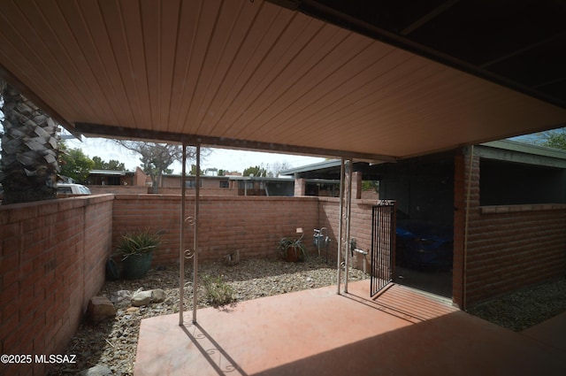 view of patio with fence