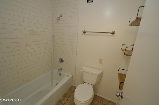 bathroom featuring visible vents, shower / bathing tub combination, toilet, baseboards, and tile patterned floors