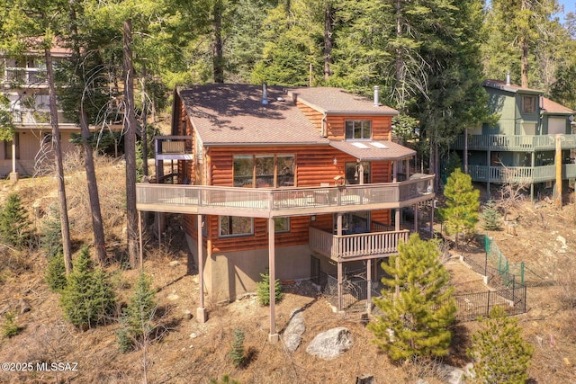 11085 E Grosbeak Ln, Mount Lemmon, AZ 85619 - back of property featuring a wooden deck, a shingled roof, and faux log siding