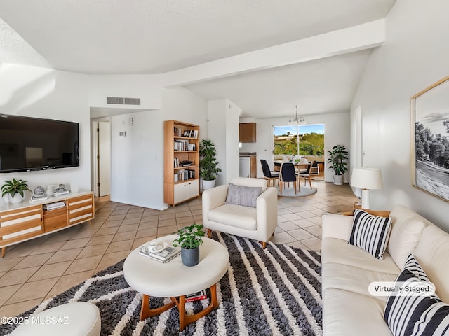 living area featuring lofted ceiling with beams, light tile patterned floors, and visible vents