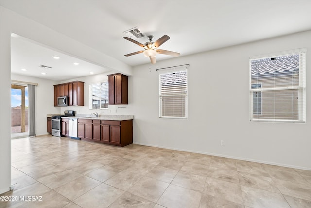 kitchen with visible vents, recessed lighting, stainless steel appliances, and baseboards