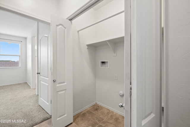 laundry area featuring washer hookup, laundry area, carpet flooring, and baseboards