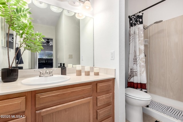 7071 E Corto Caravaca, Tucson, AZ 85715 - bathroom featuring toilet, a shower with shower curtain, and vanity