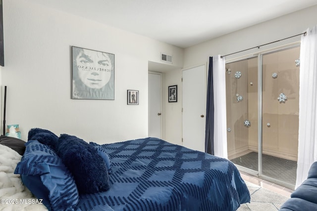 bedroom featuring visible vents