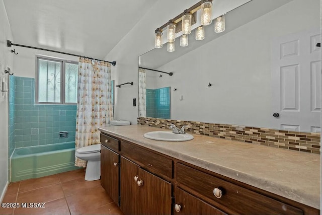 bathroom featuring vanity, toilet, backsplash, tile patterned floors, and shower / bath combination with curtain
