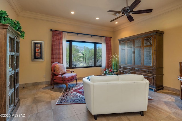 living room with ornamental molding, recessed lighting, a ceiling fan, and baseboards