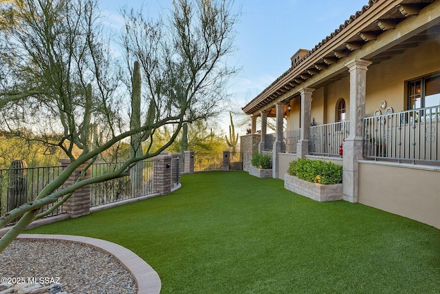 view of yard with a fenced backyard