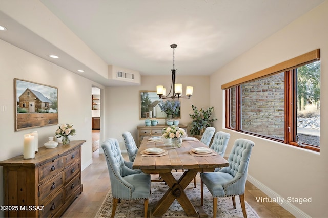 dining space featuring light wood-type flooring, visible vents, baseboards, and recessed lighting