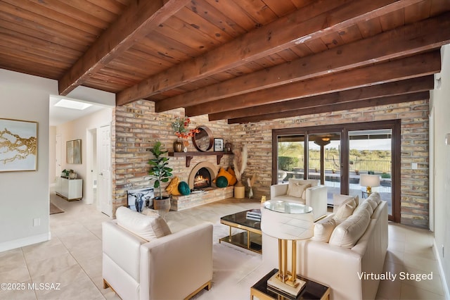 living area featuring wooden ceiling, a fireplace, light tile patterned floors, and beamed ceiling