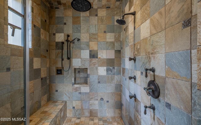 interior space featuring a tile shower