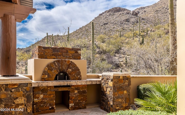 view of patio with a mountain view