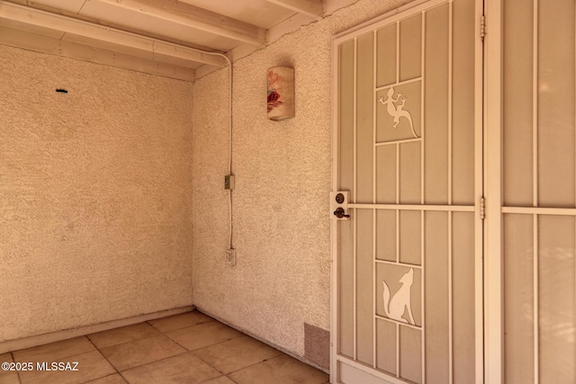 entrance to property featuring board and batten siding