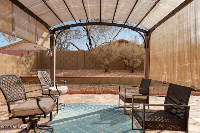 view of patio with a fenced backyard and a pergola