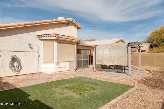 view of yard with fence and a patio