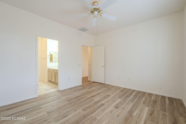 unfurnished bedroom with ensuite bathroom, ceiling fan, light wood-style flooring, visible vents, and baseboards