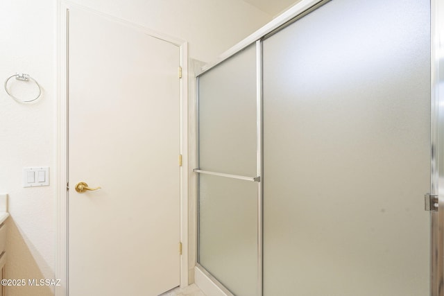 bathroom with a stall shower