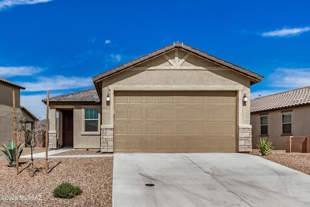 view of front of property with stone siding, driveway, an attached garage, and stucco siding