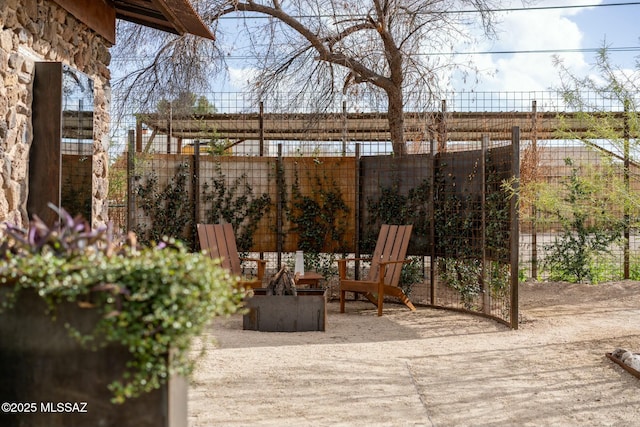 view of patio / terrace featuring fence