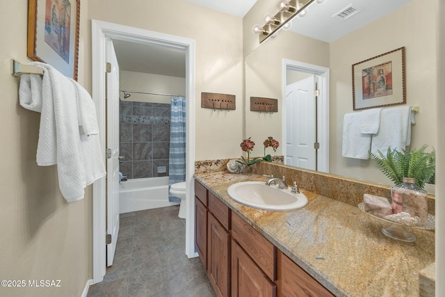 full bath with visible vents, toilet, vanity, and shower / tub combo with curtain