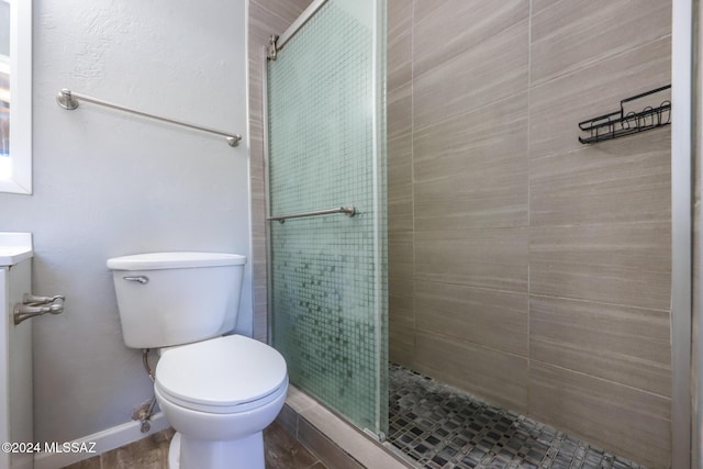 2608 E Warwick Vis, Tucson, AZ 85713 - full bath featuring a shower stall, toilet, vanity, and baseboards
