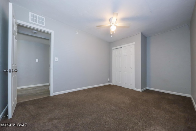 2608 E Warwick Vis, Tucson, AZ 85713 - unfurnished bedroom with carpet floors, baseboards, a closet, and ceiling fan