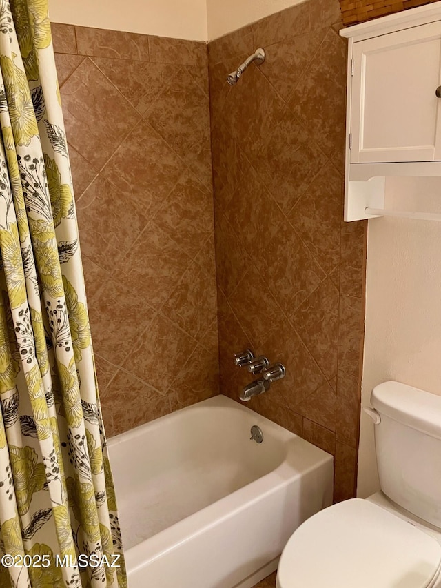 bathroom featuring toilet and shower / bathtub combination with curtain