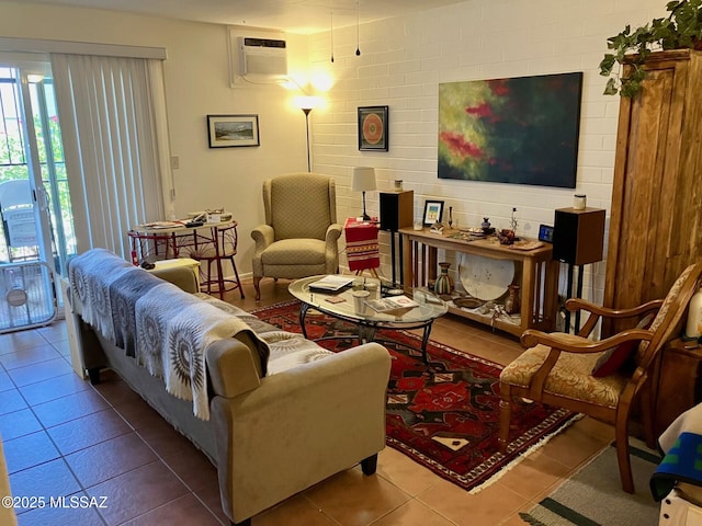 living room featuring a wall mounted AC and tile patterned flooring