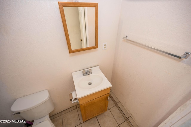 2724 N Green Pl, Nogales, AZ 85621 - half bath featuring tile patterned flooring, vanity, and toilet