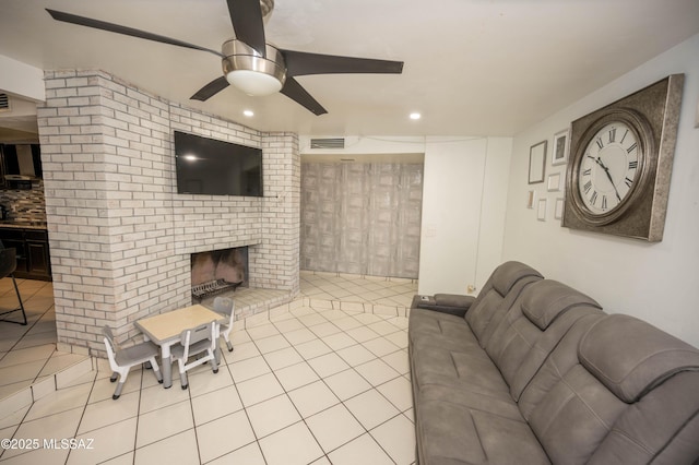 2724 N Green Pl, Nogales, AZ 85621 - tiled living room with recessed lighting, visible vents, a fireplace, and ceiling fan