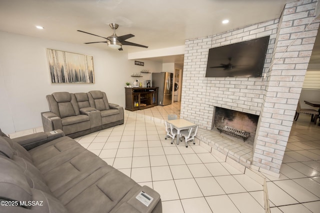 2724 N Green Pl, Nogales, AZ 85621 - living area with ceiling fan, light tile patterned flooring, a fireplace, and recessed lighting