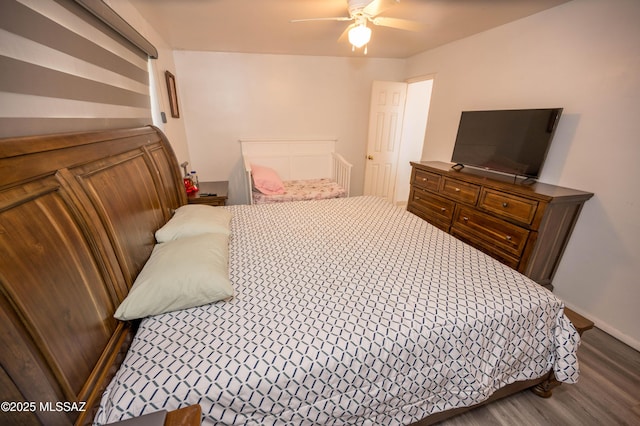 2724 N Green Pl, Nogales, AZ 85621 - bedroom with baseboards and wood finished floors