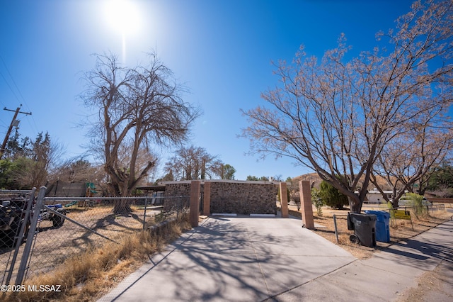 2724 N Green Pl, Nogales, AZ 85621 - exterior space featuring driveway and a gate