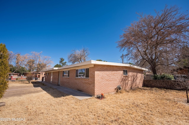 2724 N Green Pl, Nogales, AZ 85621 - view of side of home featuring brick siding