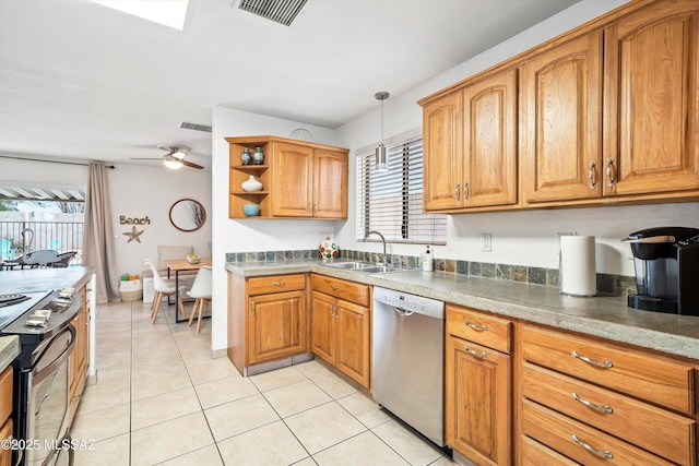 kitchen featuring a healthy amount of sunlight, visible vents, appliances with stainless steel finishes, and a sink