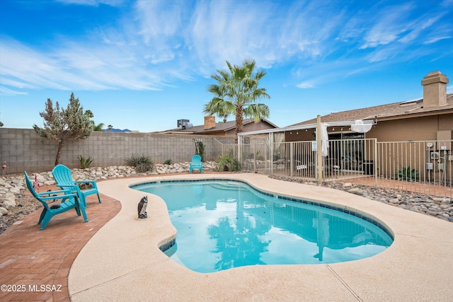 view of pool with a patio, a fenced backyard, and a fenced in pool