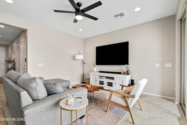 living room with marble finish floor, baseboards, visible vents, and recessed lighting