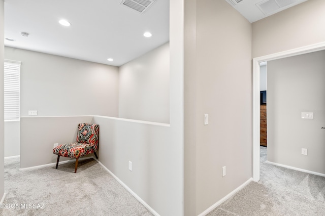 sitting room with carpet, visible vents, baseboards, and recessed lighting