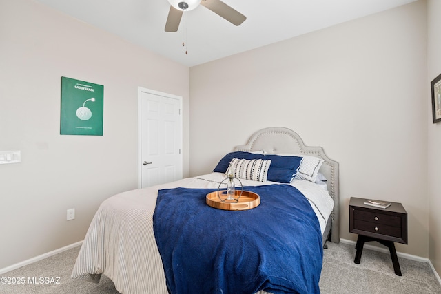 bedroom featuring ceiling fan, baseboards, and carpet flooring