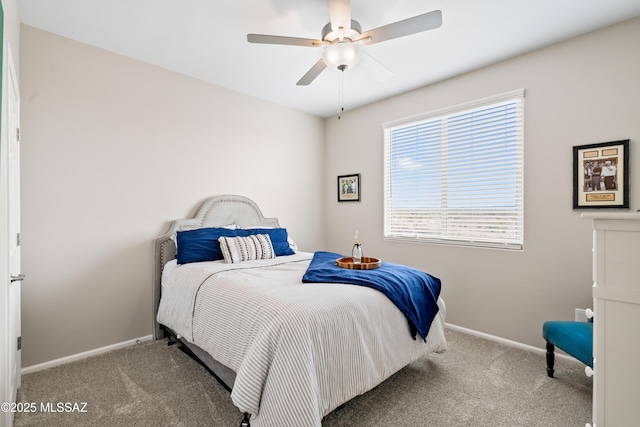 bedroom featuring a ceiling fan, baseboards, and carpet flooring