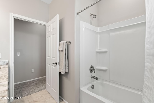 bathroom featuring shower / bathtub combination with curtain and baseboards