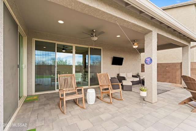 view of patio with an outdoor hangout area and ceiling fan